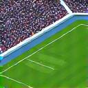 Vista aérea de um complexo desportivo moderno com campos de futebol, representando instalações premium.